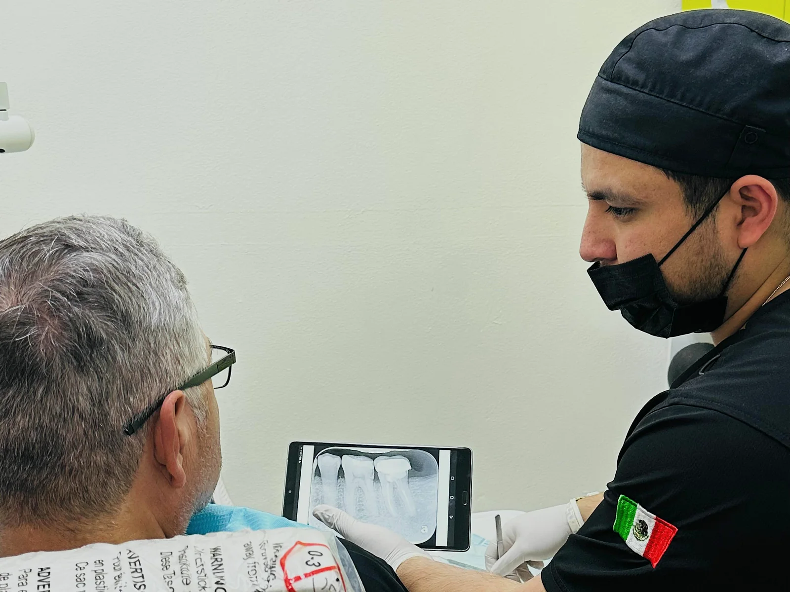 Dental radiograph consultation and explanation for a patient at Ramos Dental.